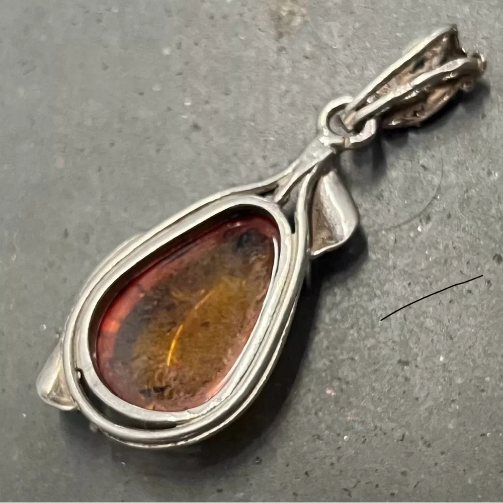 Teardrop Shaped Amber and Intricately Designed Silver Pendant - Picture 5 of 8